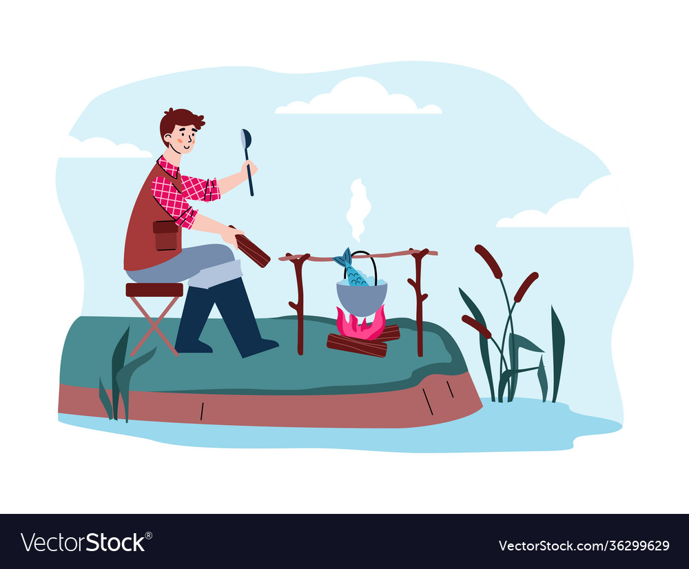 Happy fisherman sitting on shore river and cook