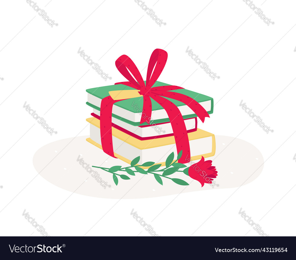 A stack of books as gift with red ribbon