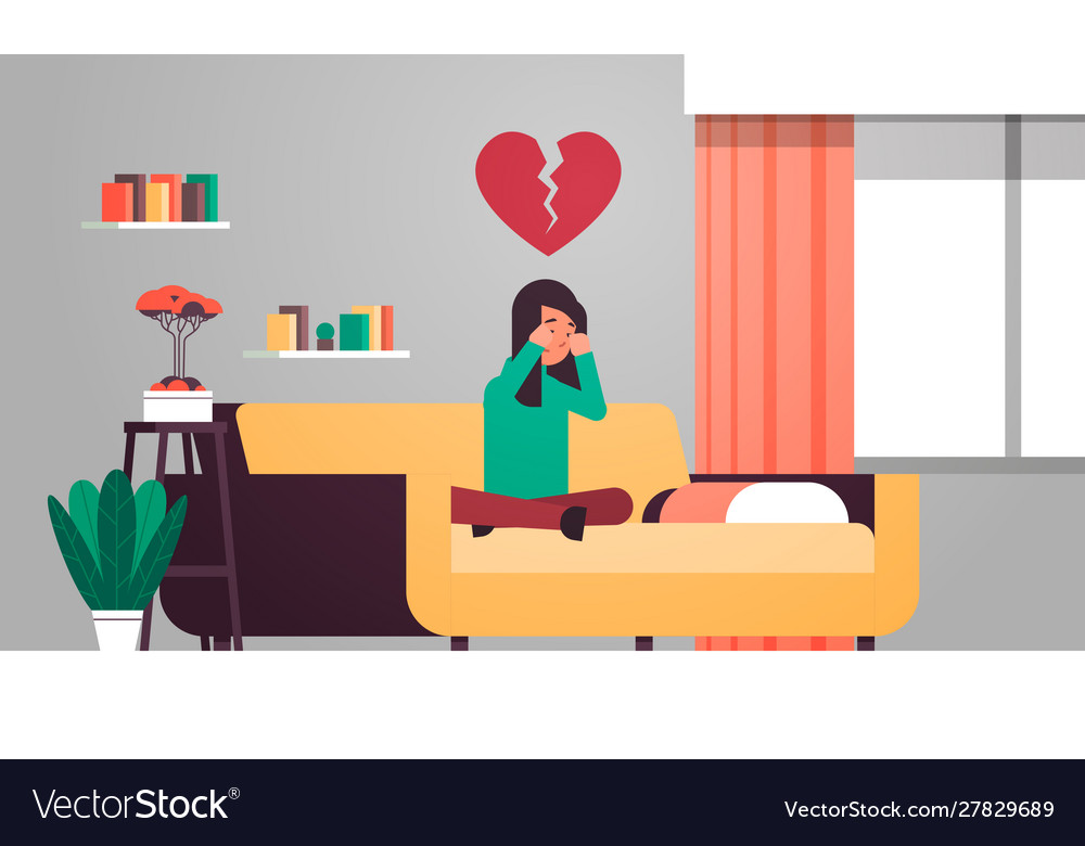 Heartbroken woman in depression sitting on couch Vector Image