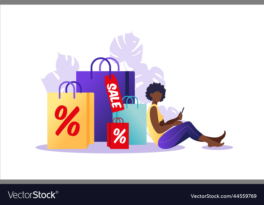 Young african woman sitting with paper bags