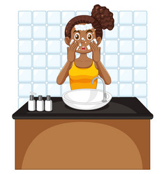 A Female Teen Cleaning Face At The Sink