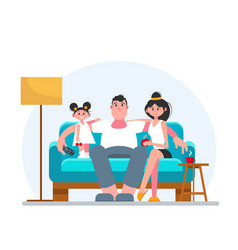 Happy Family Watching Tv On The Sofa