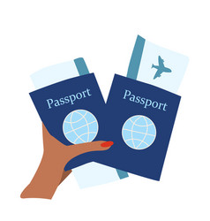 Passports And Air Tickets In A Womans Hand