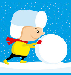 Child Pushes A Big Snowball