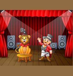 A Lion Circus With Trainer Performing On Stage