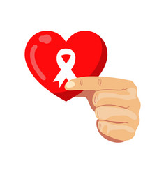 Aids Day Ribbon On Red Heart