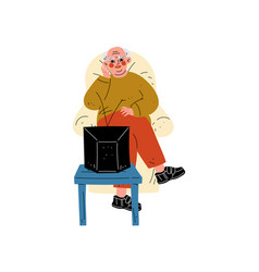 Senior Man Sitting On Armchair Watching Tv