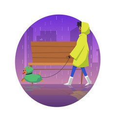 Woman In Raincoat Walking A Dog In Rainy Weather