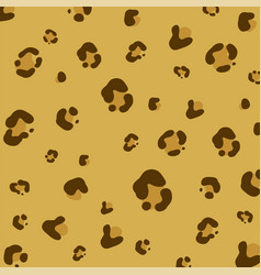 Brown And Black Leopard Spots On Tan Background