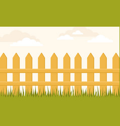 Yellow Wooden Fence With Green Grass On A Beige