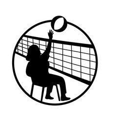 Female Senior Chair Volleyball Player Spiking