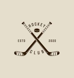 Ice Hockey Stick And Puck Logo Vintage Template