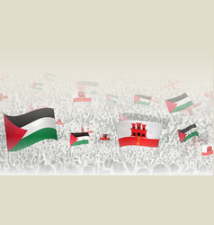 Palestine And Gibraltar Flags In A Crowd