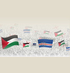 Palestine And Cape Verde Flags In A Crowd Of