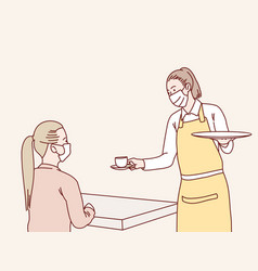 Female Waitress Serving Coffee To Customer In Cafe