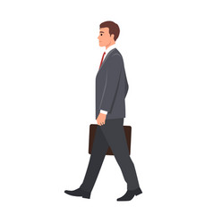 Side View Of A Young Businessman Walking Forward