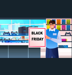 Male Seller Consultant With Black Friday Board