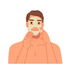 Man Applying Clay Mask On Face