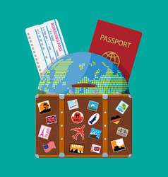 Travel suitcase with stickers and world map Vector Image