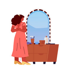 Woman In Front Of Mirror Taking Or Putting