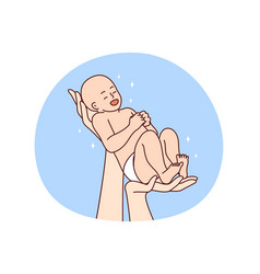 Hands Holding Newborn Baby