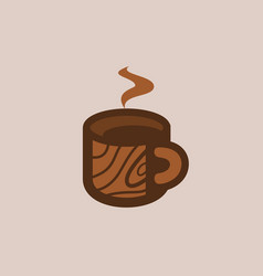 A Cup Of Brown Coffee With A Wood Grain Logo