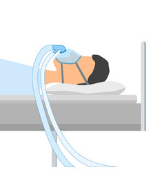 Man Lies On A Bed With A Mask Cpap