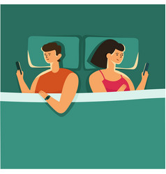 Man And Woman Lying In Bed Night Using Smartphone