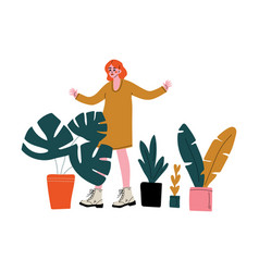 Young Woman Selling House Plants At Marketplace