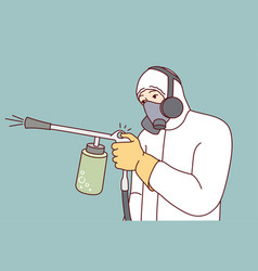 Male Exterminator Spraying Pesticide