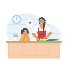 Happy Mother Cooking With Daughter In Kitchen