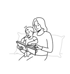 Caring Mother Reading Book With Baby