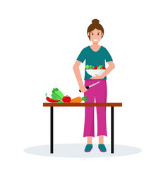 Woman Cooking Salad In Kitchen