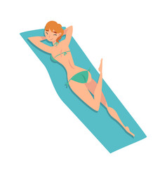 Young Woman Lying On Her Stomach Sunbathing