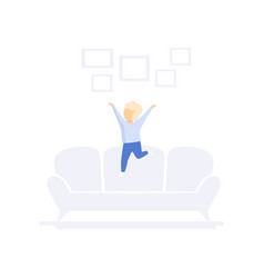 Child Jumping On Sofa Family Lifestyle Concept