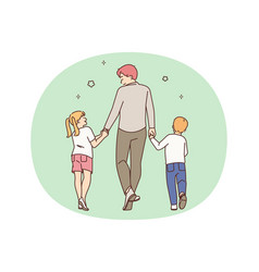 Loving Father Walking With Small Children