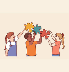 Diverse Kids Hold Puzzle Pieces As Together Solve