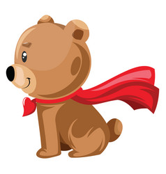 Light Brown Bear Sitting With A Red Cape On White