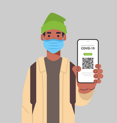 Man In Mask Holding Digital Immunity Passport