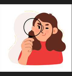 A Woman Looks Through Magnifying Glass