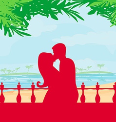 Couple Kissing On A Beach