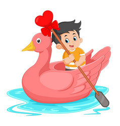 Cute Boys Are Rowing On A Swan-shaped Boat