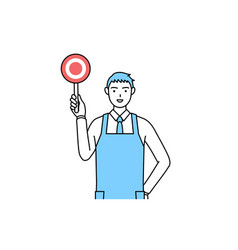 A Man In An Apron Holding Malleable Stick