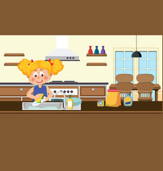 A Girl Washing Dishes In The Kitchen