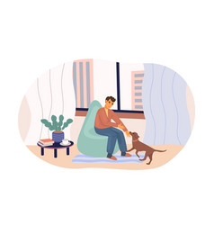 Man Playing With Lovely Dog Sitting On Armchair