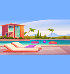 House And Swimming Pool With Deck Chairs