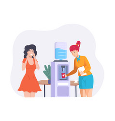 Female Colleagues Standing Near Water Cooler