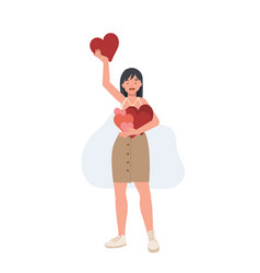 Happy Woman Holding A Red Hearts Shape In One