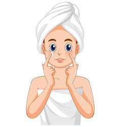 A Woman In Towel Doing Face Massage