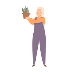 Happy Senior Woman Gardener Holding Potted Plant